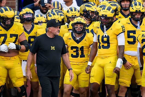 Kyle Whittingham and Michigan Team