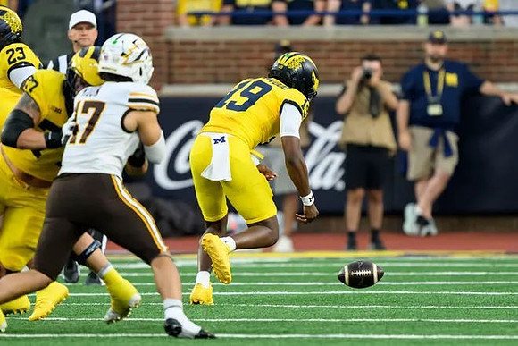 Jordan Marshall (23), Blake Frazier (77), and Bryce Underwood (19)