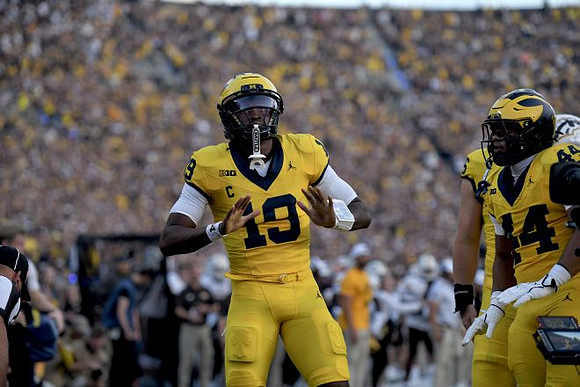 Bryce Underwood (19) and Eli Owens (44)