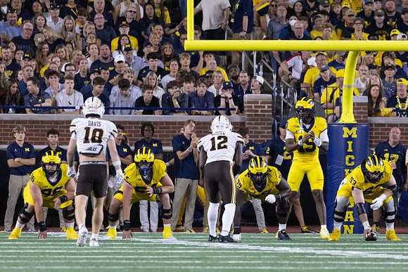 Bryce Underwood (19) and Michigan Team