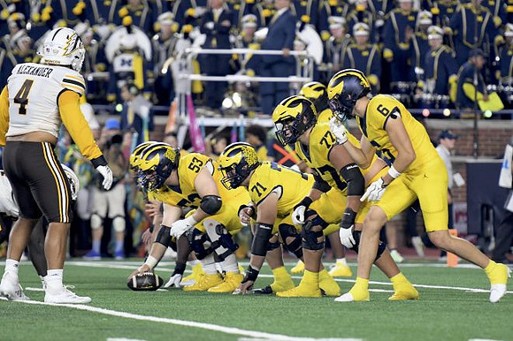 Jake Guarnera (53), Evan Link (71), Blake Frazier (77), and JJ Buchanan (6)