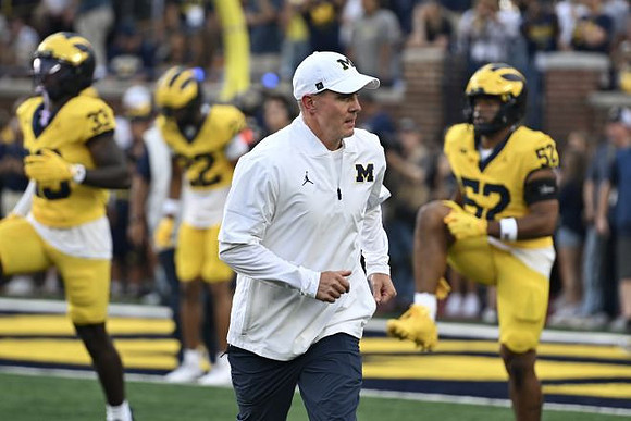 Jay Hill and Michigan Team