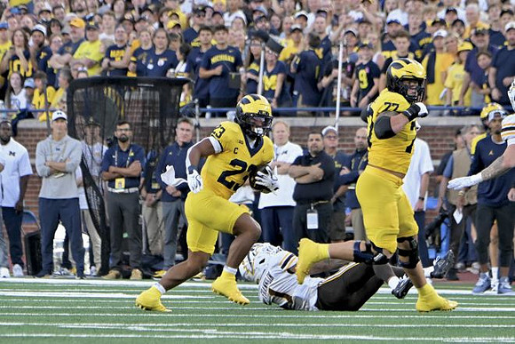 Jordan Marshall (23) and Blake Frazier (77)