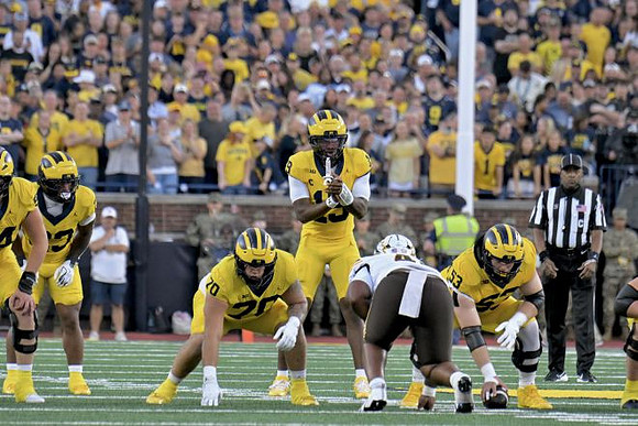 Jordan Marshall (23), Brady Norton (70), Bryce Underwood (19), and Jake Guarnera (53)