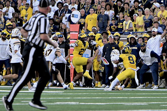 Jordan Marshall (23) and Channing Goodwin (9)
