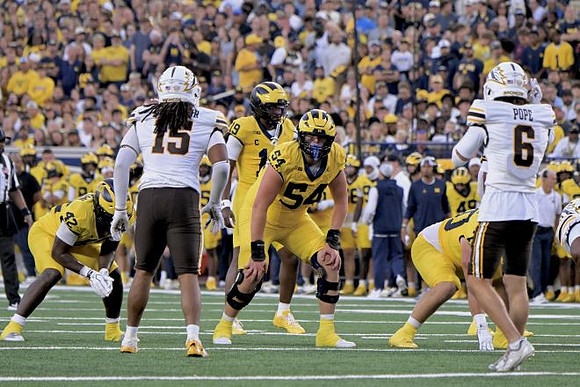 Jalen Hoffman (42), Bryce Underwood (19), and Andrew Sprague (54)