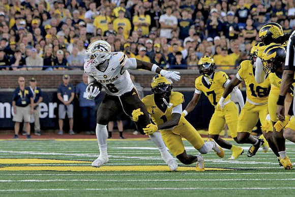 Rod Moore (1), Chris Bracy (7), and Troy Bowles (18)