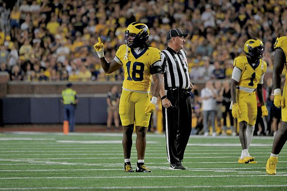Troy Bowles (18) and Rod Moore (1)