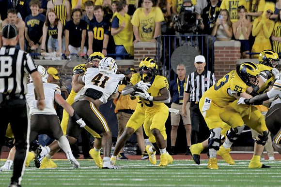 Brady Norton (70), Savion Hiter (5), and Jake Guarnera (53)