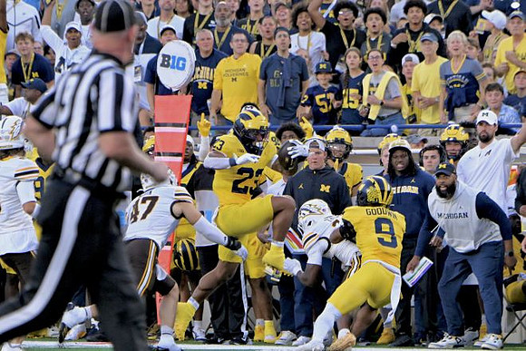 Jordan Marshall (23) and Channing Goodwin (9)
