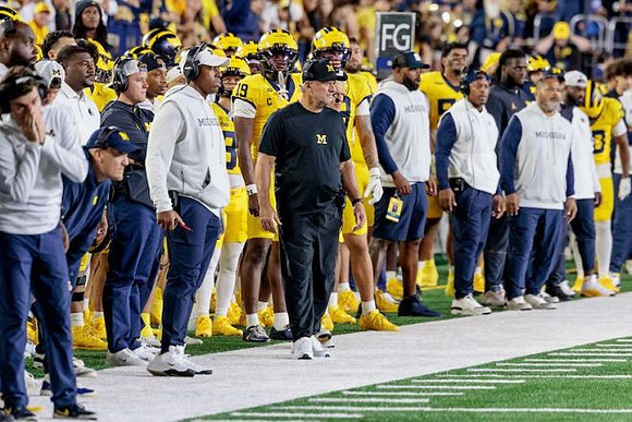 Kyle Whittingham and Michigan Team