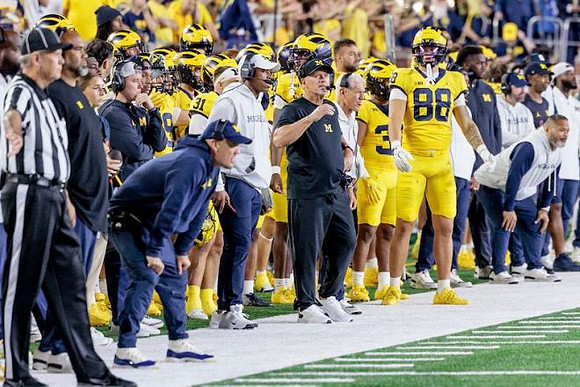 Kyle Whittingham and Michigan Team