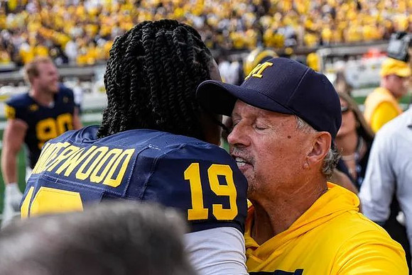 Bryce Underwood (19) and Kyle Whittingham
