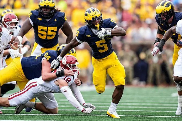 Andrew Sprague (54), Nathan Efobi (55), and Savion Hiter (5)