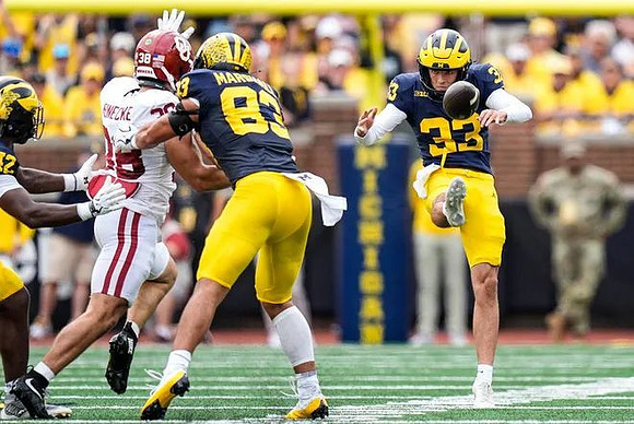 Jalen Hoffman (42), Zack Marshall (83), and Cam Brown (33)