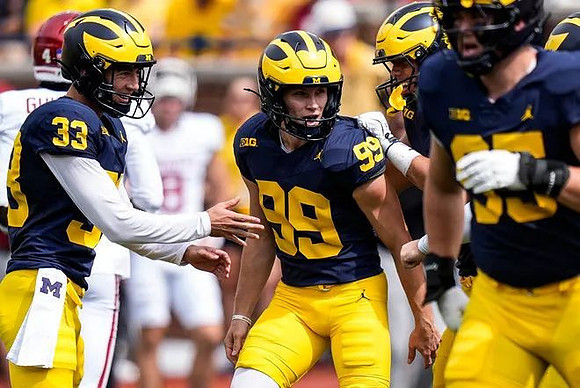 Cam Brown (33) and Trey Butkowski (99)
