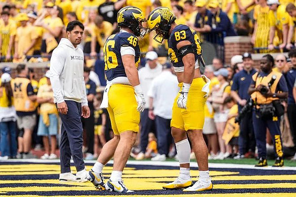 Crandall Quinn (46) and Zack Marshall (83)