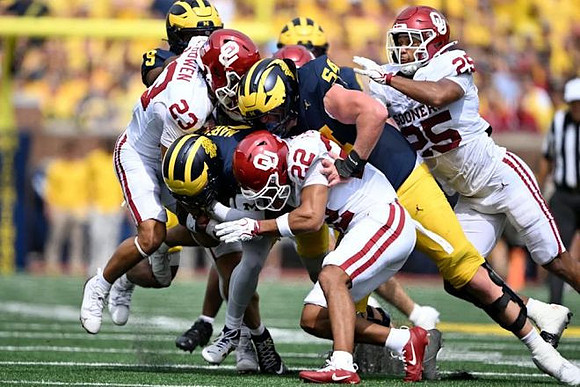 Channing Goodwin (9), Jordan Marshall (23), and Andrew Sprague (54)