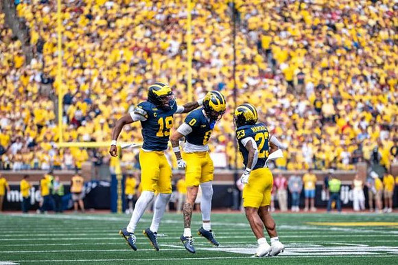Bryce Underwood (19), Kendrick Bell (0), and Jordan Marshall (23)