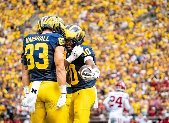 Zack Marshall (83) and Zeke Berry (10)