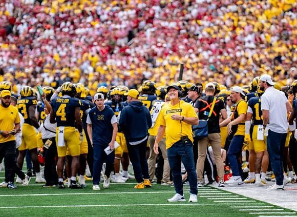 Kyle Whittingham and Michigan Team