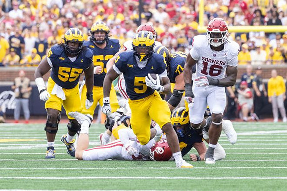 Savion Hiter (5), Nathan Efobi (55), Jake Guarnera (53), and Blake Frazier (77)