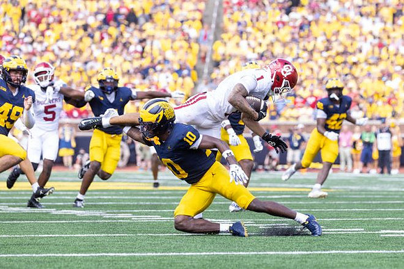 Nico Crawford (49), Zeke Berry (10), and Jalen Hoffman (42)