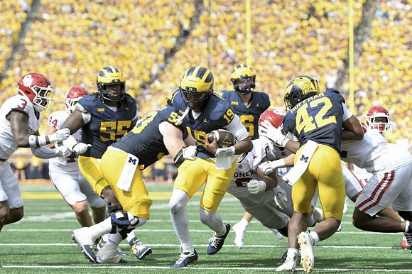 Nathan Efobi (55), Jake Guarnera (53), Bryce Underwood (19), JJ Buchanan (6), and Jalen Hoffman (42)
