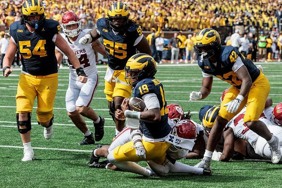 Andrew Sprague (54), Nathan Efobi (55), Bryce Underwood (19), and Jalen Hoffman (42)