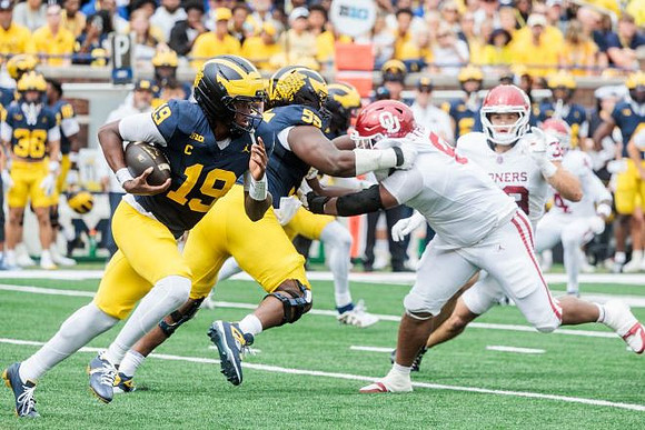 Bryce Underwood (19) and Nathan Efobi (55)