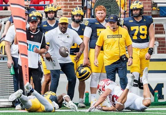 Smith Snowden (3), Kyle Whittingham, and Michigan Team