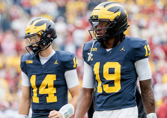 Tommy Carr (14) and Bryce Underwood (19)