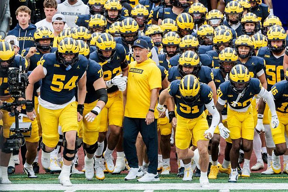 Kyle Whittingham and Michigan Team