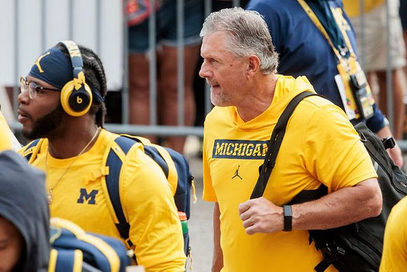 Kyle Whittingham and Michigan Team