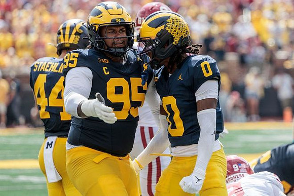 Nathaniel Staehling (44), Trey Pierce (95), and Jyaire Hill (0)