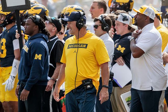 Kyle Whittingham and Michigan Team