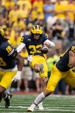 Troy Bowles (18), Cam Brown (33), and Zack Marshall (83)