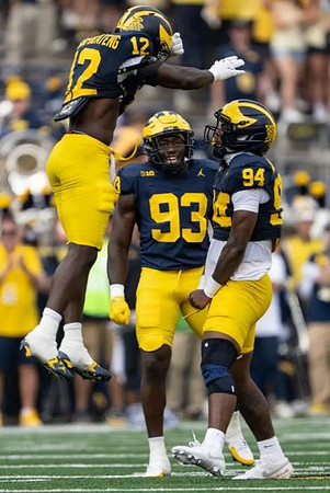 Nathaniel Owusu-Boateng (12), Benny Patterson III (93), and Nate Marshall (94)