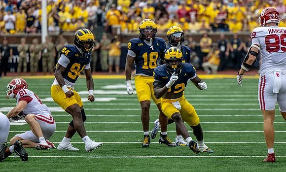 Nate Marshall (94), Troy Bowles (18), and Nathaniel Owusu-Boateng (12)