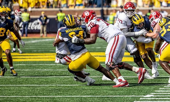 Troy Bowles (18), Nate Marshall (94), and Benny Patterson III (93)