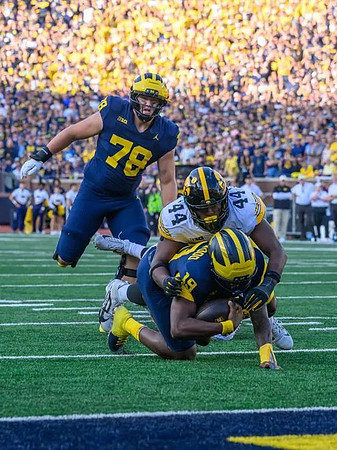 Marky Walbridge (78) and Bryce Underwood (19)