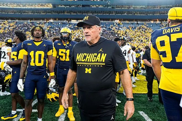 Zeke Berry (10), McHale Blade (51), Kyle Whittingham, and Titan Davis (97)