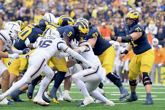 Brady Norton (70), Savion Hiter (5), Jake Guarnera (53), Blake Frazier (77), and Evan Link (71)