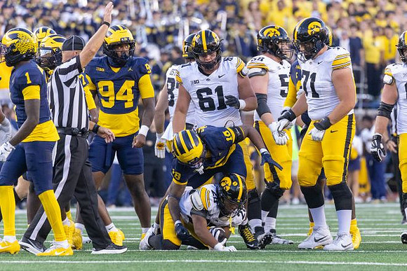 Rod Moore (1), Nate Marshall (94), and Troy Bowles (18)