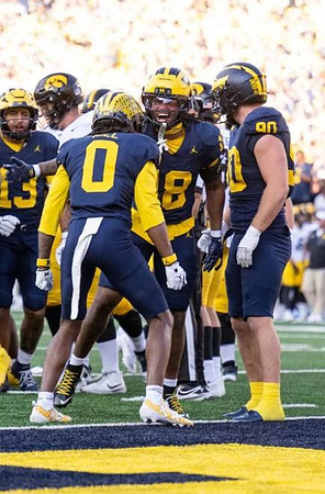Aisea Moa (13), Jyaire Hill (0), Dom Nichols (8), and John Henry Daley (90)