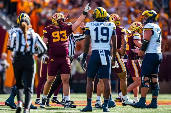 Bryce Underwood (19) and Blake Frazier (77)