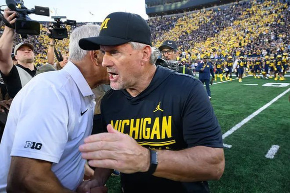 Iowa Head Coach Kirk Ferentz and Kyle Whittingham