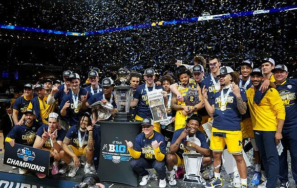 Dusty May, Michigan Team, and Big Ten Tournament Championship Trophy