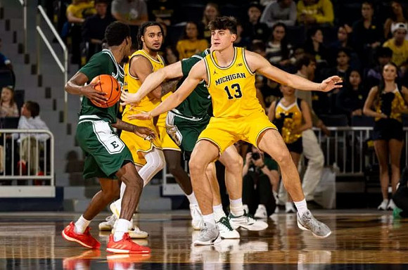 Elliot Cadeau (3) and J.P. Estrella (13)