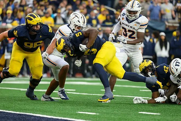 Manuel Beigel (96), Savion Hiter (5), and Jalen Hoffman (42)